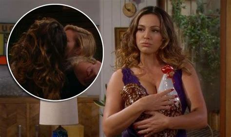 kelly brook shows off some serious cleavage as she kisses female co star on one big happy