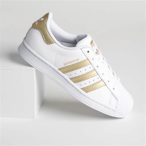 elevating  style  adidas gold stripe shoes shoe effect