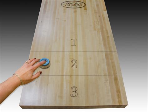how to play table shuffleboard with triangle