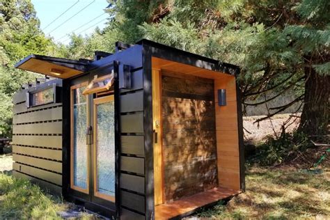shipping container turned  compact tiny house   container homes  sale container