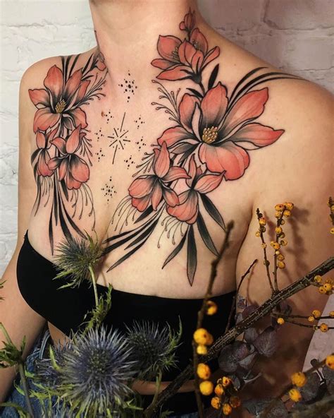 floral chest tattoo   chest tattoos  women cool chest