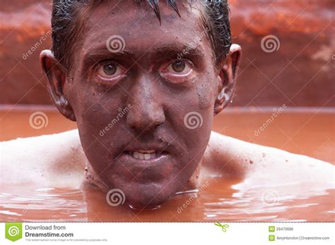 man from the red mud royalty free stock image image