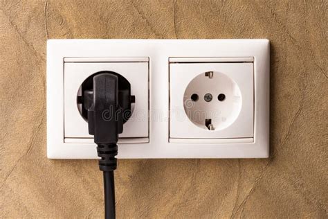 european double white electrical outlet socket device connected