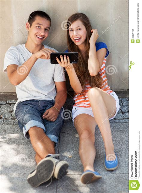 Teenage Couple With Digital Tablet Stock Image Image Of