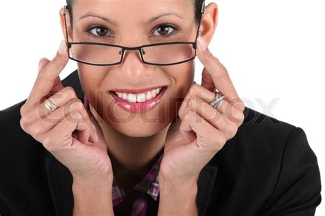 Woman Adjusting Her Glasses Stock Image Colourbox