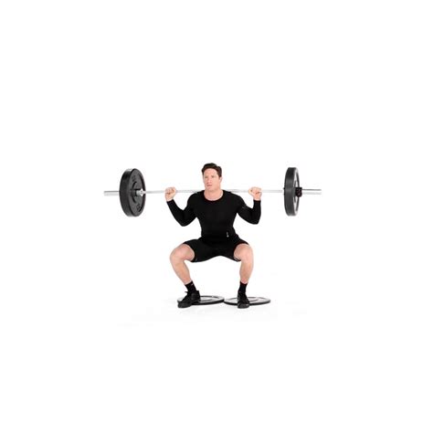 barbell squat with heels raised video watch proper form get tips and more muscle and fitness