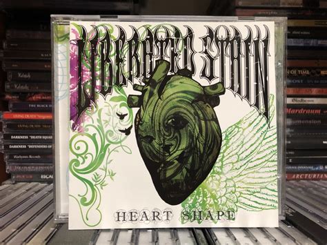 liberated stain heart shape cd photo metal kingdom