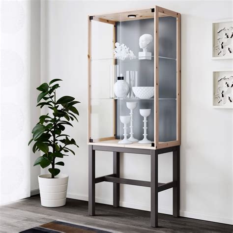 glass front display cabinets   budget apartment therapy