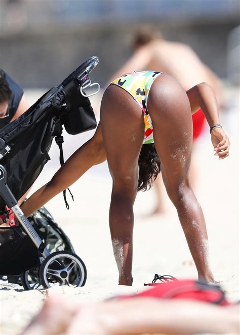 kelly rowland shows off her perfect body in a colorful one piece bikini at the beach in sydney