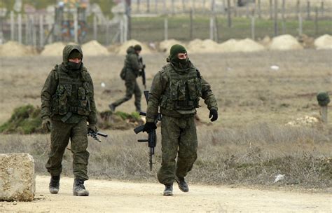 26 disquieting photos of armed russians still surrounding ukrainian soldiers in crimea
