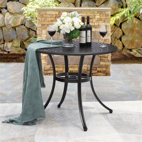 wicker outdoor dining table  umbrella hole chesterbrook learn