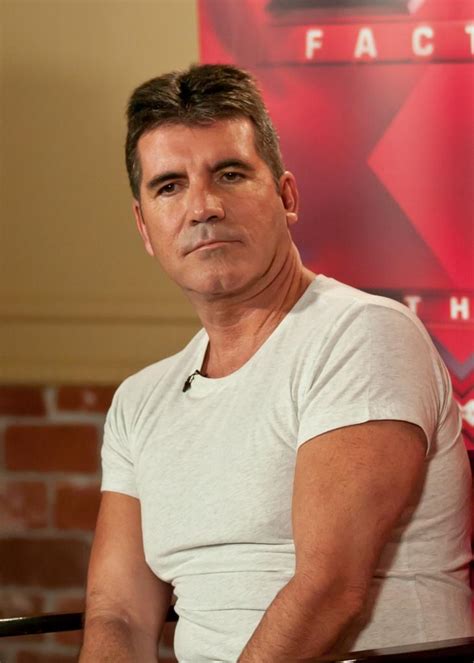simon cowell named  divorce papers celebrity buzz