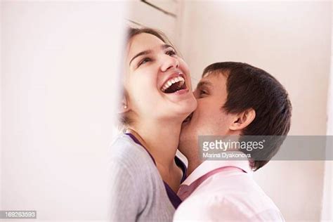 kissing on woman s neck photos et images de collection getty images