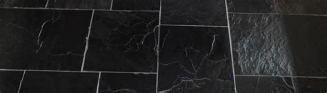 tired black slate tiled floor  sevenoaks restored west kent tile doctor