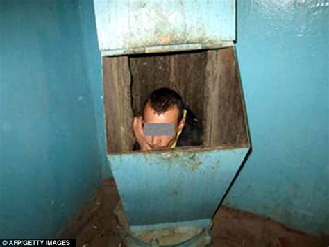 russian man gets caught in trash chute while trying to escape blazing row with girlfriend