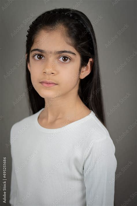 a school age indian ethnicity girl portrait shots with different