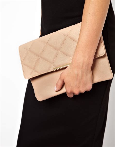 asos clutch bag  oversized quilted flap  nude natural lyst