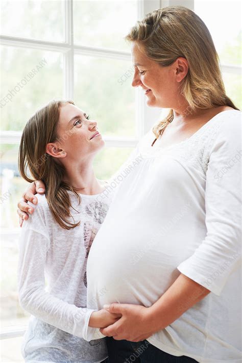 Pregnant Mother With Teenage Daughter Stock Image F007 9201