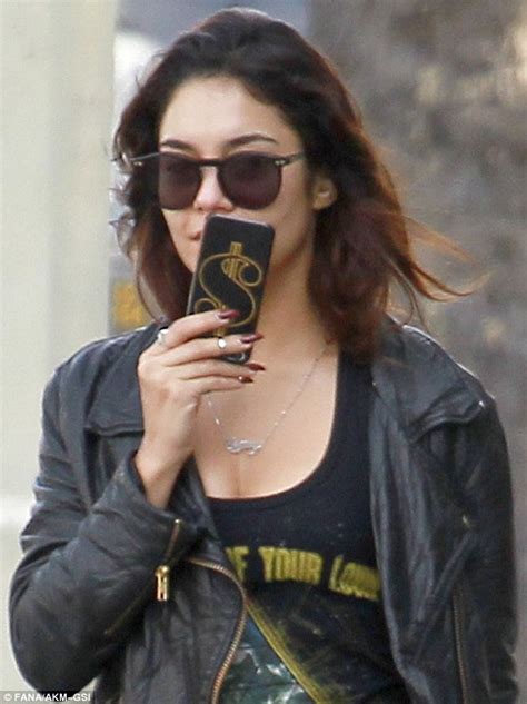 Vanessa Hudgens Sports Dollar Sign On Her Phone As She Goes Grunge In