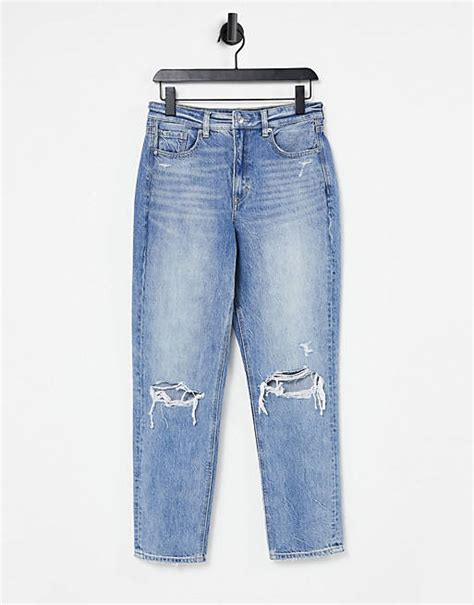american eagle mom jeans with ripped knees in mid wash blue asos