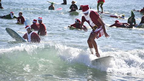 surfing santas ride waves along florida s space coast