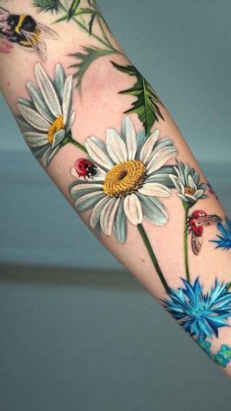 50 Cheerful Daisy Tattoos You Must See Tattoo Me Now In 2021 Daisy