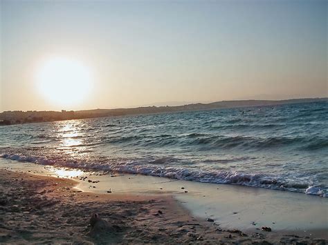 beautiful empty beach  sunset  robertpatrick redbubble