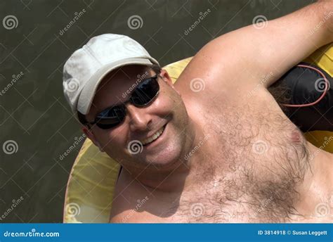 man   float stock photo image  swimming warm lifestyle