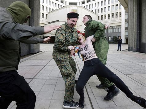 Femen Protesters Held In Ukraine After Topless Protest Near Crimean