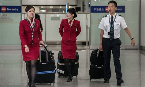 cathay pacific air stewardesses complain uniform is too revealing daily mail online