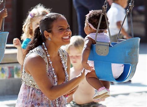 christina milian plays with her princess in the park