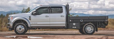 flatbeds upfitter  builder  custom  standard flatbed work trucks highway products