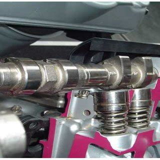 exploded   dual overhead camshaft engine  scientific diagram