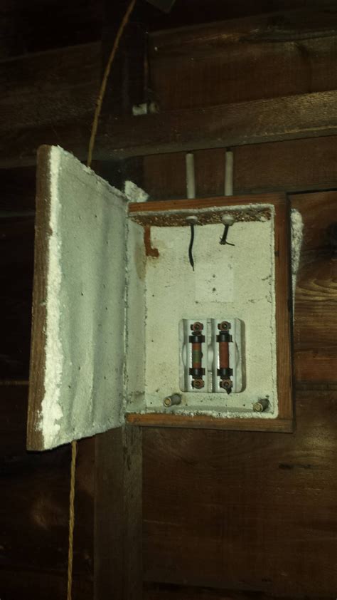 asbestos lined  amp fuse box   wood electricians