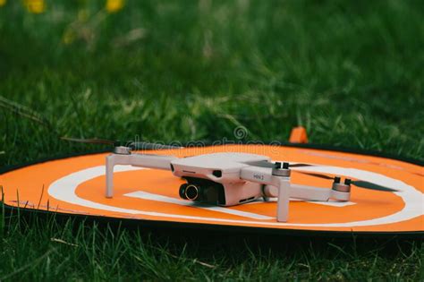 dji mavic mini  drone  orange landing mat pad editorial stock image image  closeup