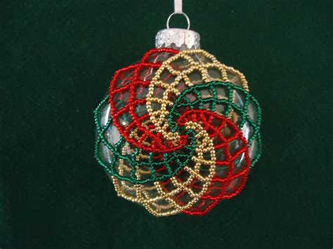 spiral beaded ornament  gold red  green