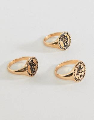 asos design set van goudkleurige ringen met romeinse munt asos