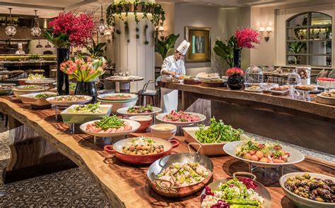 seasons hotel singapore unveils revamped   restaurant