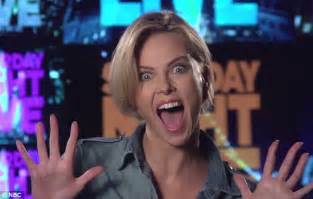 charlize theron pulls cringe worthy model faces for snl