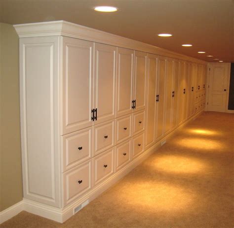 formal storage cabinets  basement family room family room storage