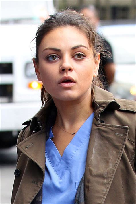 mila kunis photos mila kunis wears hospital scrubs and a stained coat as she films scenes for