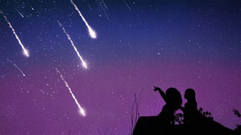 hundreds  multi coloured shooting stars  streak   sky