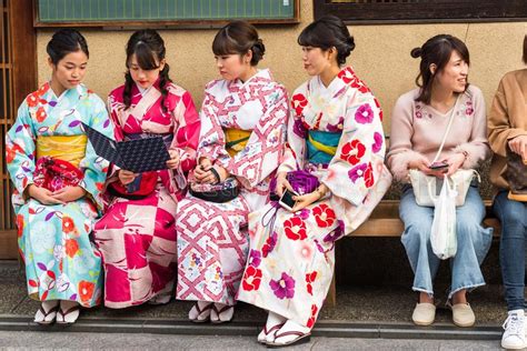 Kyoto Japan November 7 2017 A Group Of Girls In A Kimono Sit On A