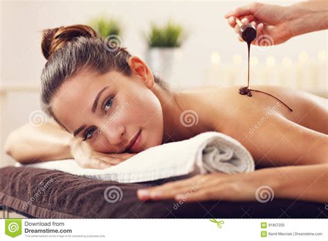 Beautiful Woman Getting Chocolate Massage In Spa Stock