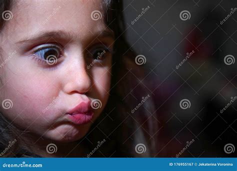 girl  big eyes  funny faces  copy space stock image