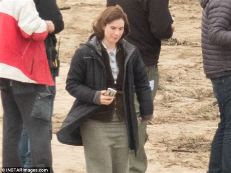 lily james covers up on location for new film in guernsey