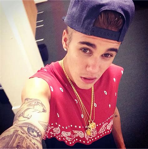 justin bieber now hit with threat of x rated strip club