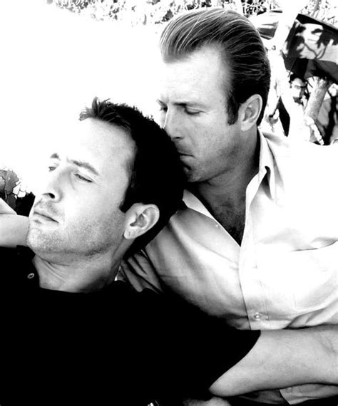 alex o loughlin and scott caan and yes it does appear he is smelling his hair mcdanno o caan