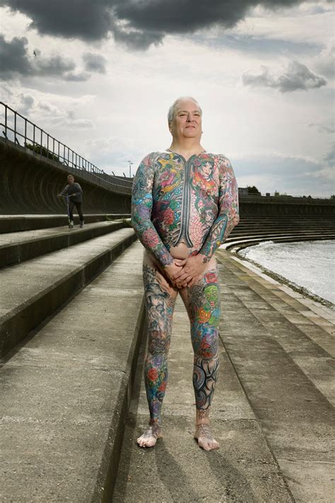 photos chronicle heavily tattooed people both covered up and exposed