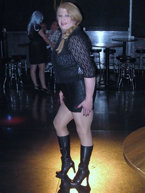 new black leather knee high boots and leather mini skirt with lace top
